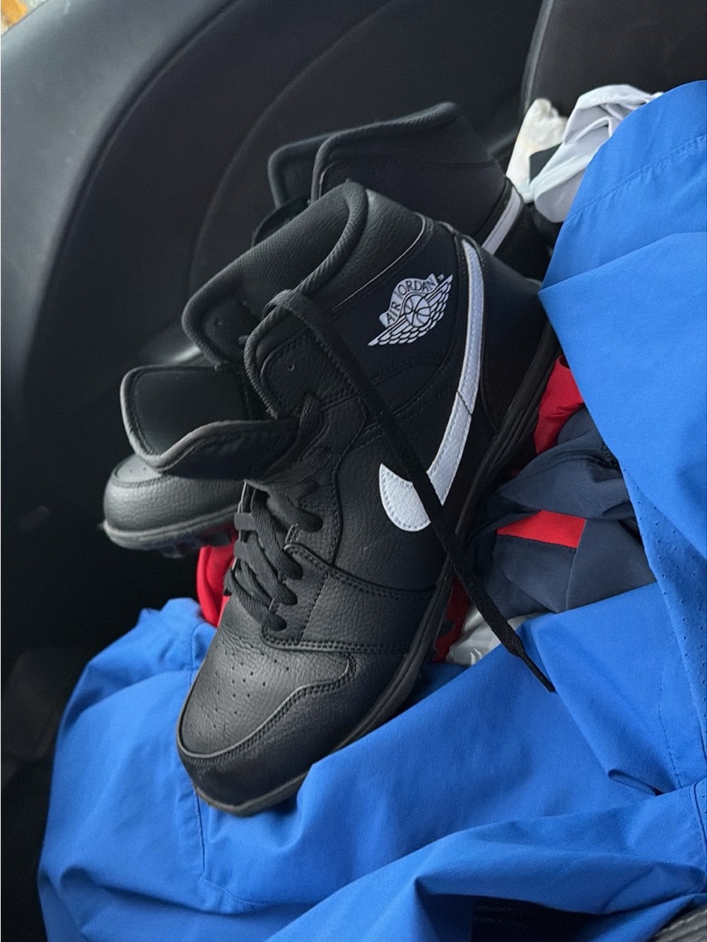 Jordan Black and White Mid-Top Sneakers
